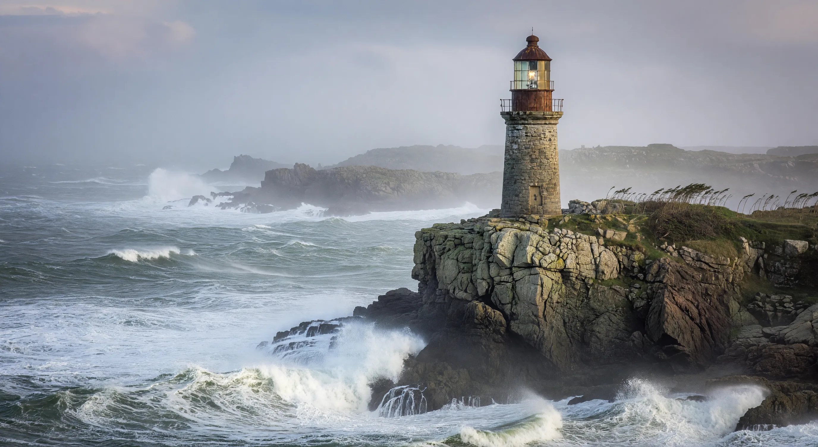 Old lighthouse on windy cliff